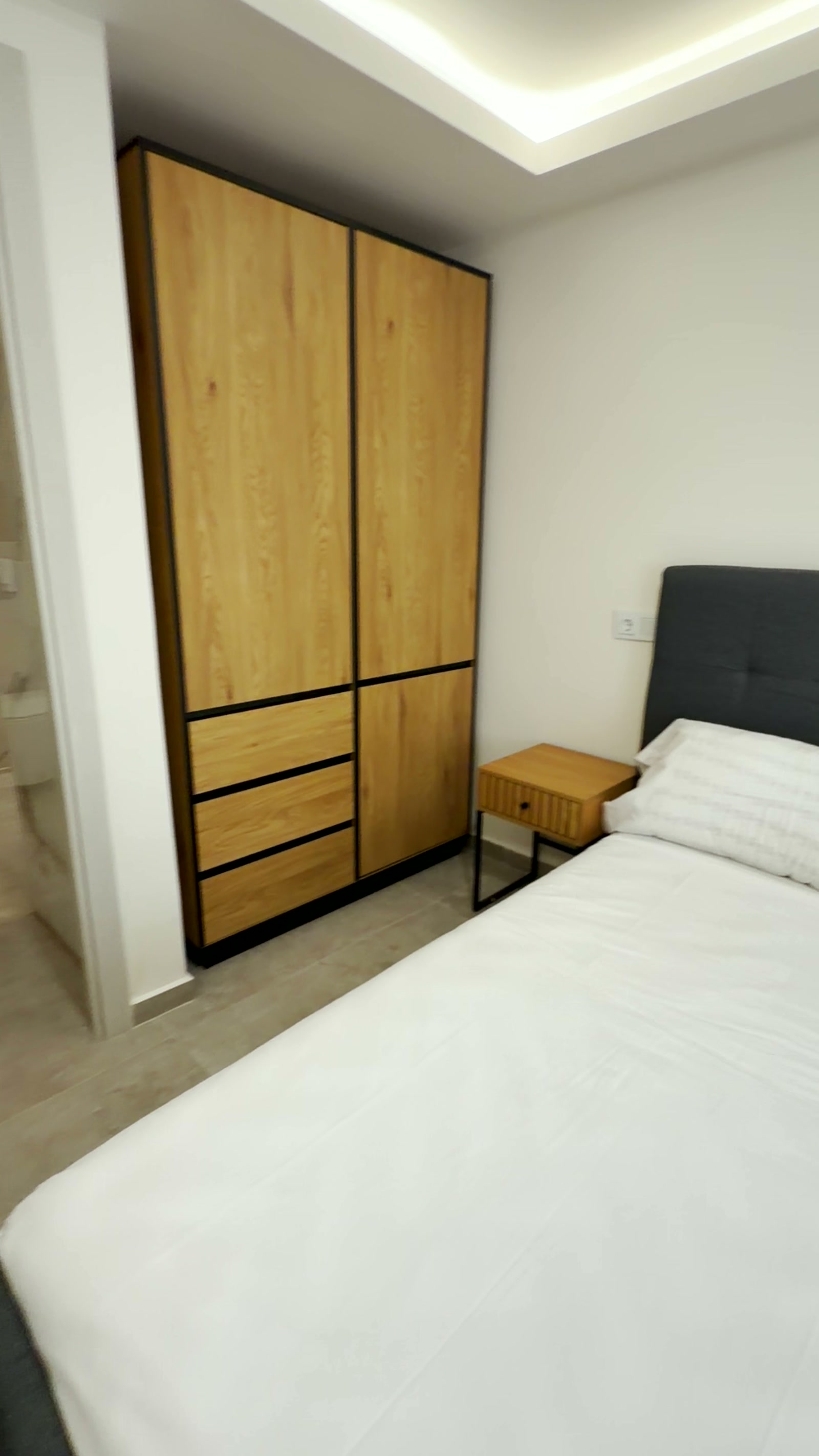Dormitorio con vestidor